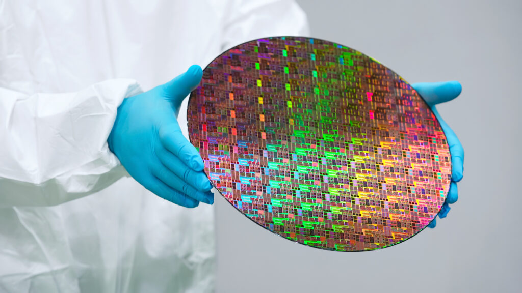 A silicon wafer with printed circuit designs.